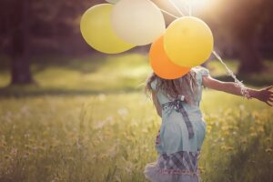 girl with balloons